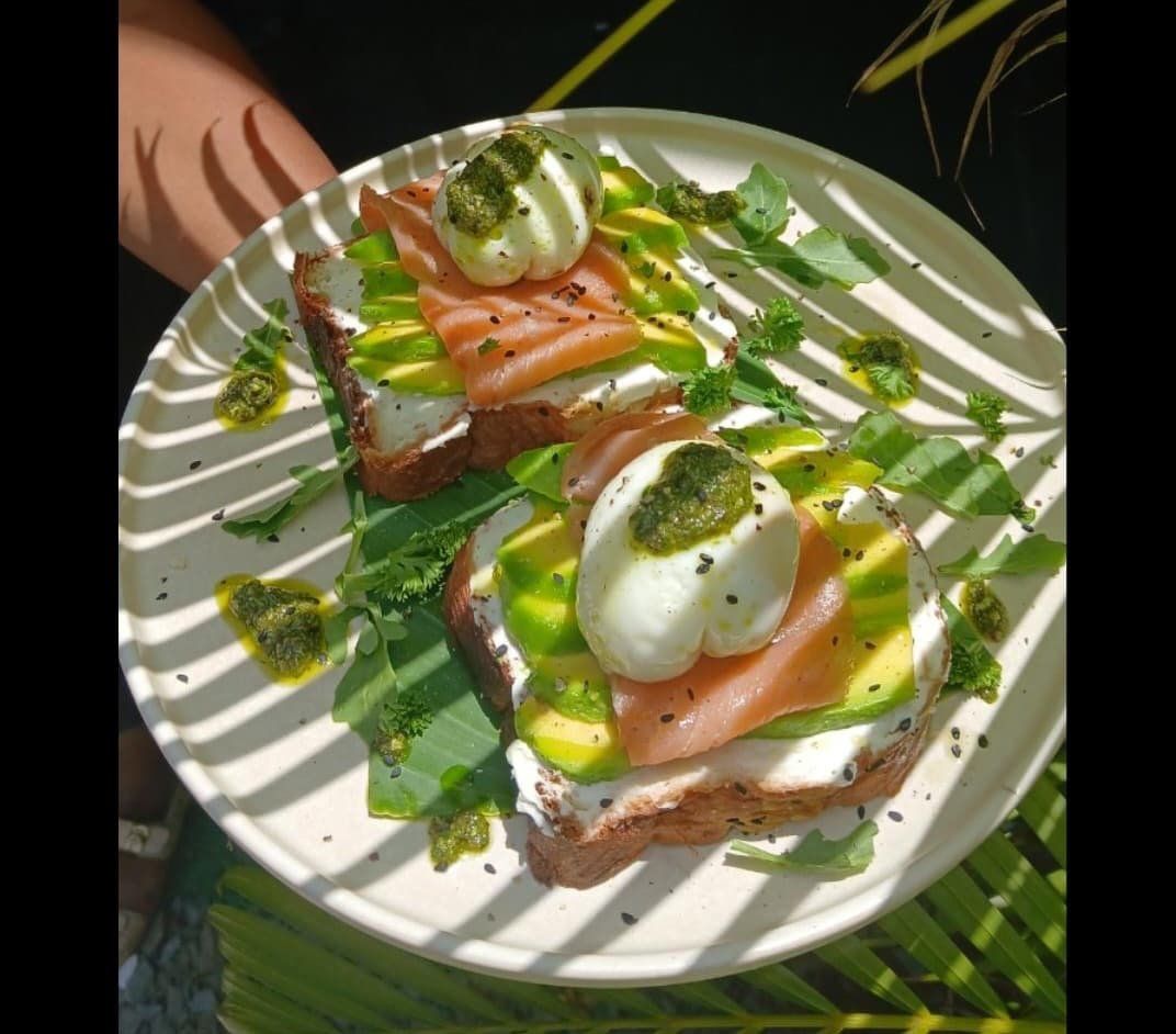 Salmon, avocado & burrata toast with pesto