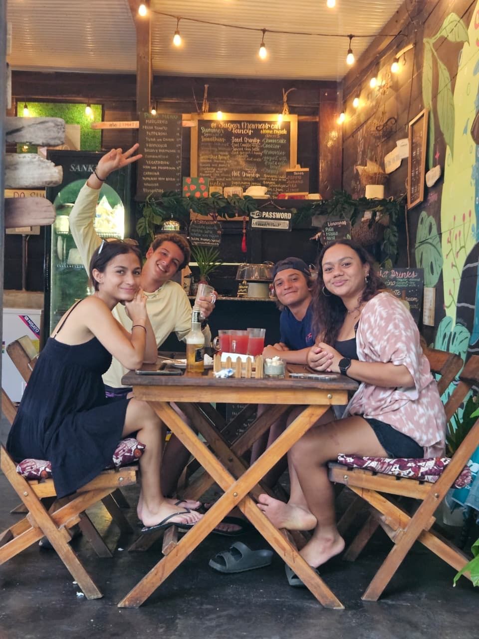Friends sharing a moment at Sugar Mama's Café
